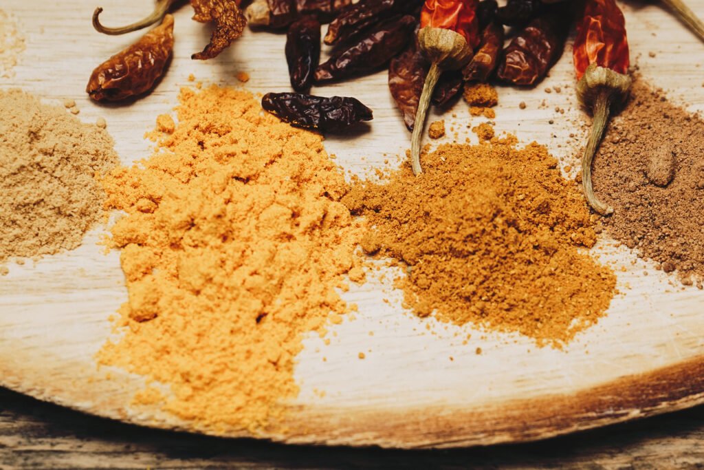 image of spices and dried peppers for a taco seasoning recipe